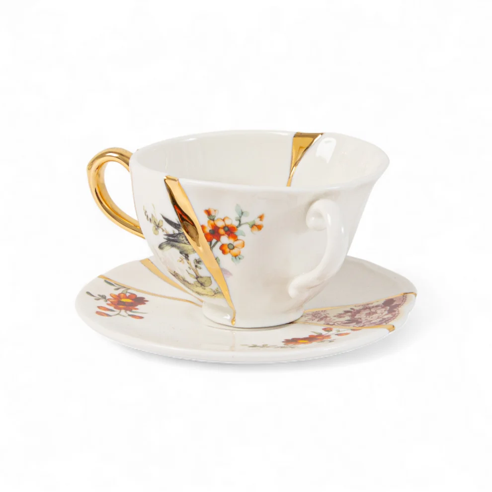 SET DA TE CON TAZZA E PIATTINO IN 
PORCELLANA E ORO "KINTSUGI" n.1