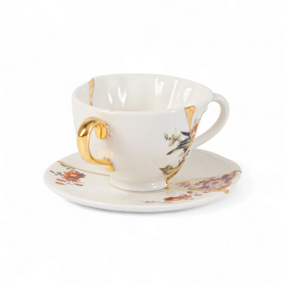 SET DA TE CON TAZZA E PIATTINO IN 
PORCELLANA E ORO "KINTSUGI" n.1