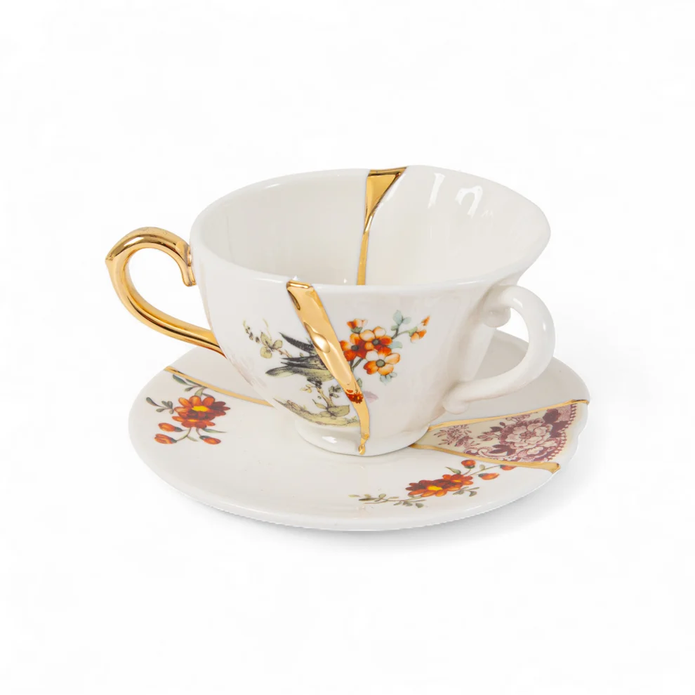SET DA TE CON TAZZA E PIATTINO IN 
PORCELLANA E ORO "KINTSUGI" n.1