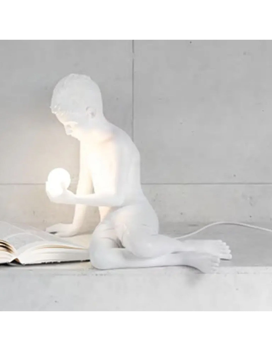 SELETTI - SCULTURA IN RESINA CON LUCE LED "INNER GLOW_S" BOY
